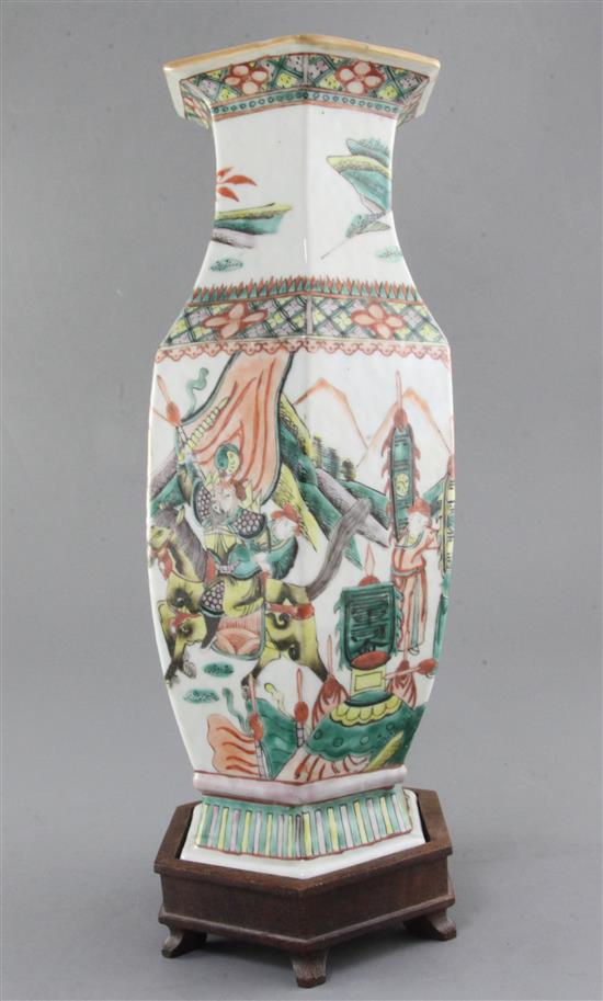 A Chinese famille verte hexagonal baluster vase, late 19th century, height 35cm, wood stand